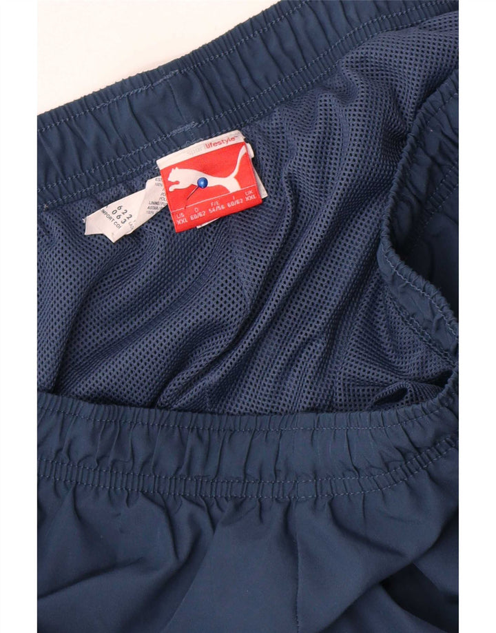 Calça de treino masculina Puma Graphic Capri 2XL azul marinho poliéster