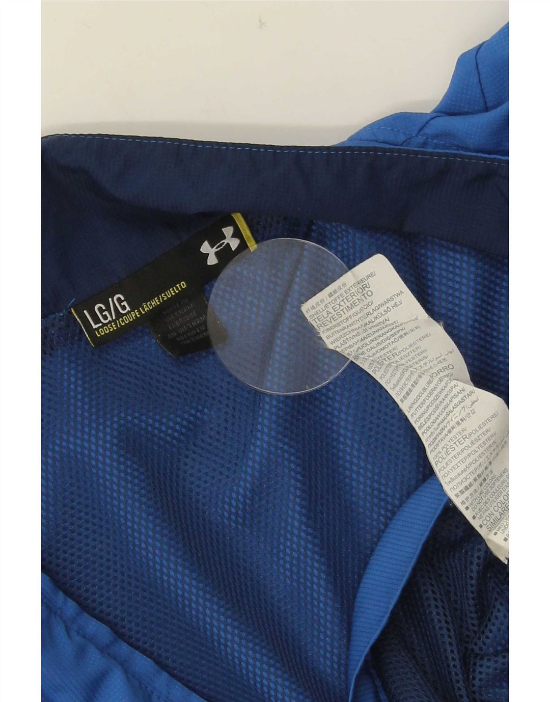 Sob a jaqueta superior do fato de treino dos homens da armadura grande poliéster azul de Colourblock