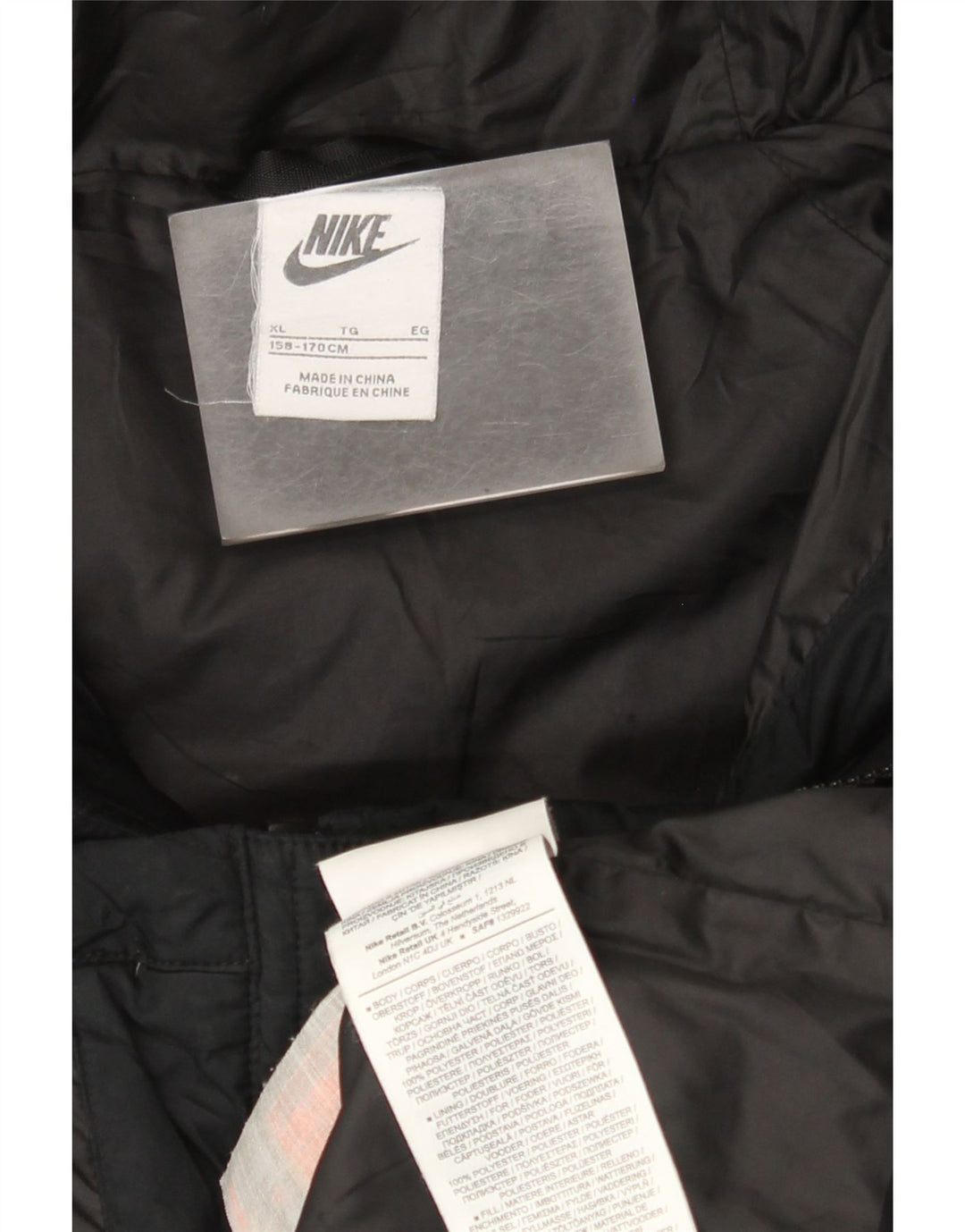 Jaqueta acolchoada com capuz Nike Boys 13-14 anos XL preto colorblock poliéster