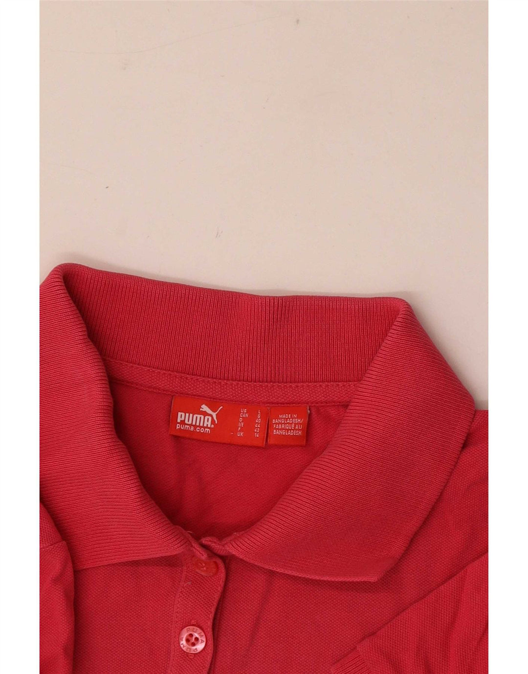 Camisa polo feminina Puma UK 14 rosa médio