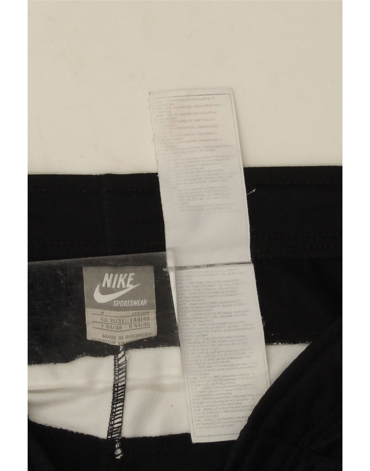 Calça de treino masculina Nike pequena preta colorblock poliéster