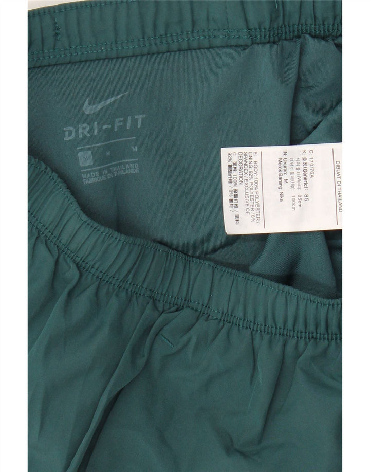 Shorts esportivos Nike masculinos Dri Fit Graphic verde médio colorblock poliéster