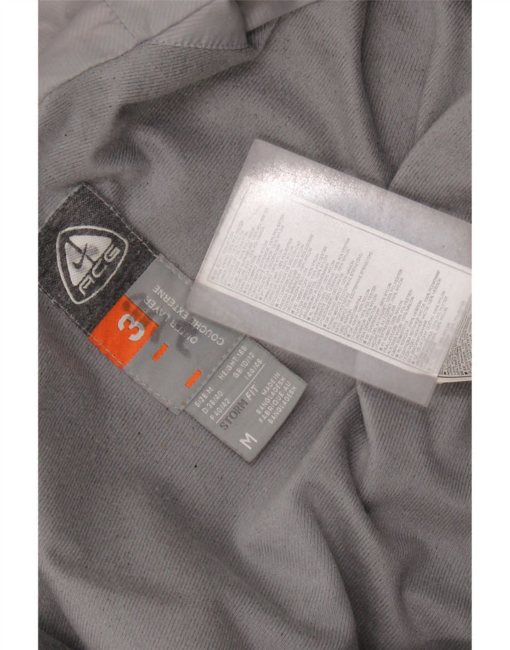 Jaqueta corta-vento feminina NIKE Storm-Fit UK 14 Medium Red Colourblock