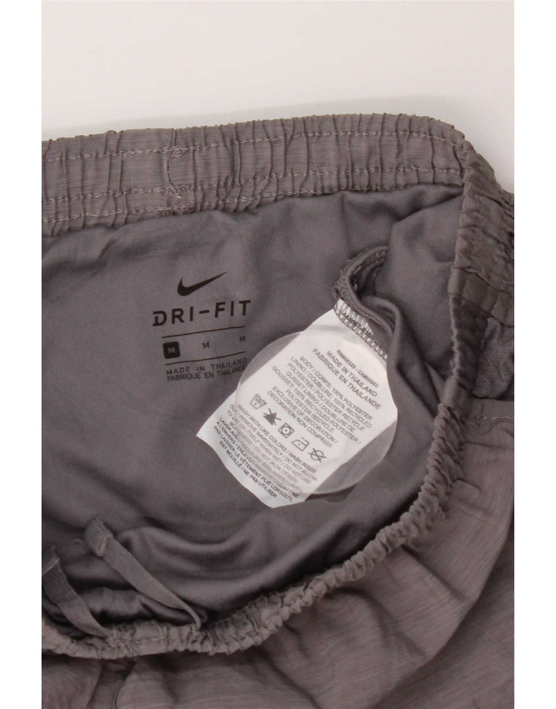 Shorts esportivos Nike Girls Dri Fit 10-11 anos cinza médio poliéster