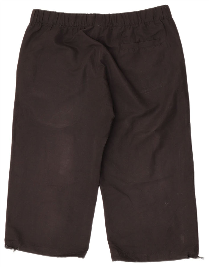 Shorts esportivos femininos Puma UK 14 grandes pretos