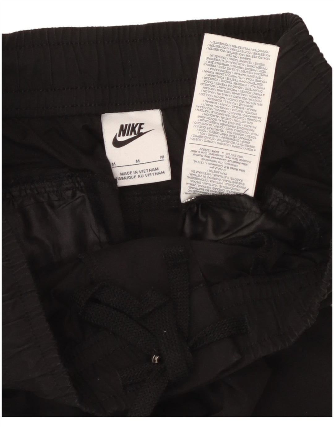 Calça cargo masculina Nike Tapered de algodão preto médio