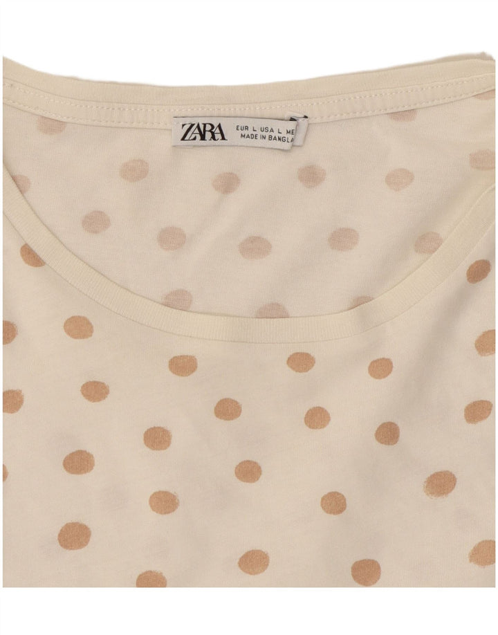 Camiseta feminina ZARA UK 16 grande bolinha branca