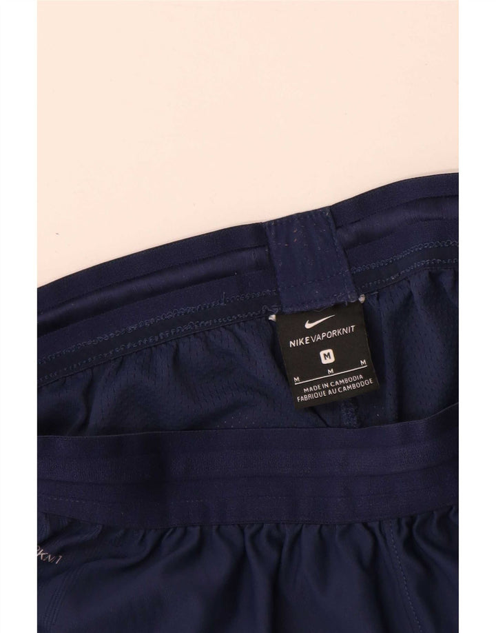 Shorts esportivos gráficos masculinos Nike médio azul marinho colorblock