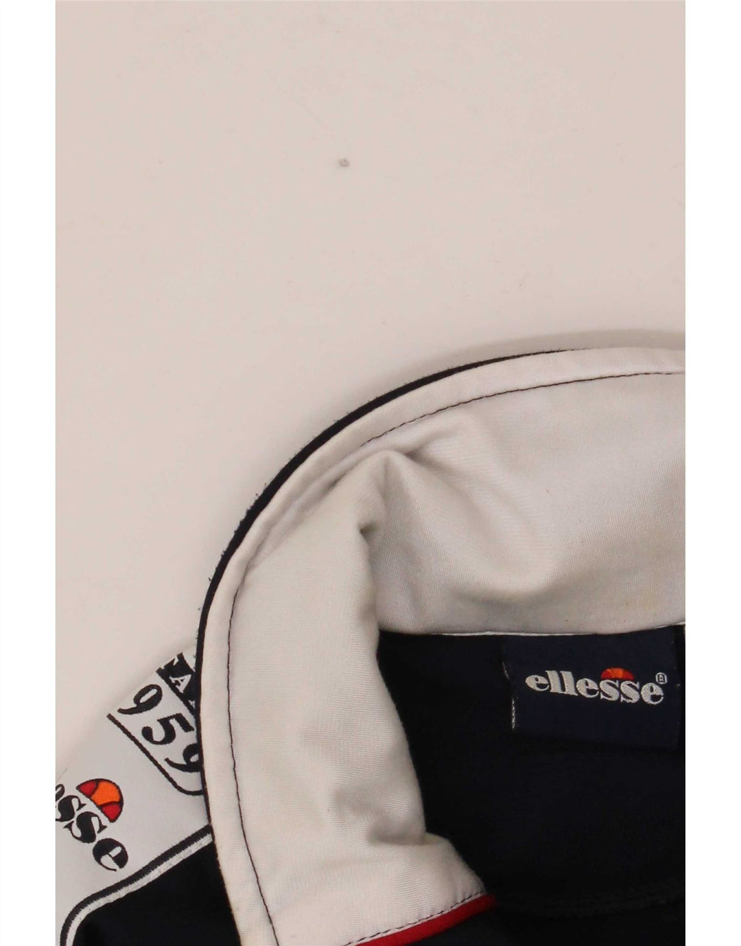 Ellesse Jaqueta masculina de agasalho gráfico grande bloco colorido azul marinho
