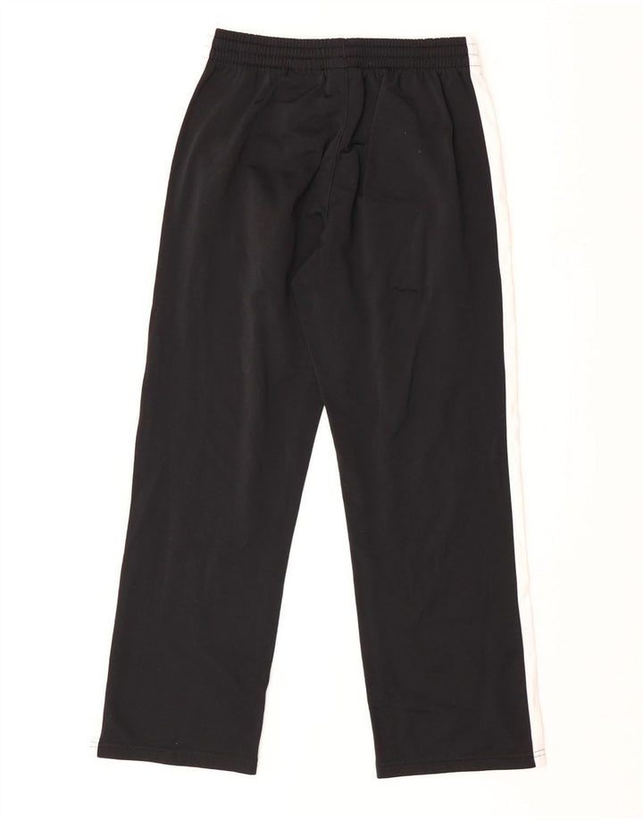 Calça de treino gráfica Nike Boys 10-11 anos médio preto colorblock