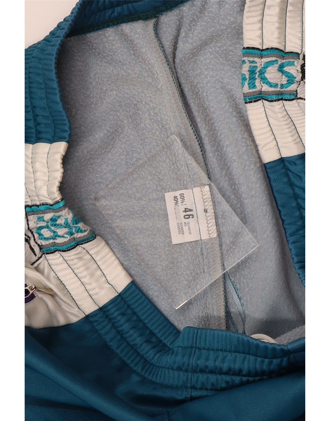 Calça de treino masculina ASICS Graphic IT 46 Small Blue Colourblock