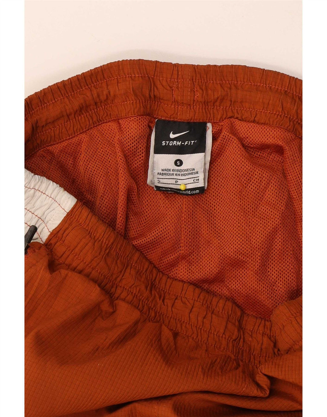 Calça de treino masculina Nike pequena marrom colorblock poliéster