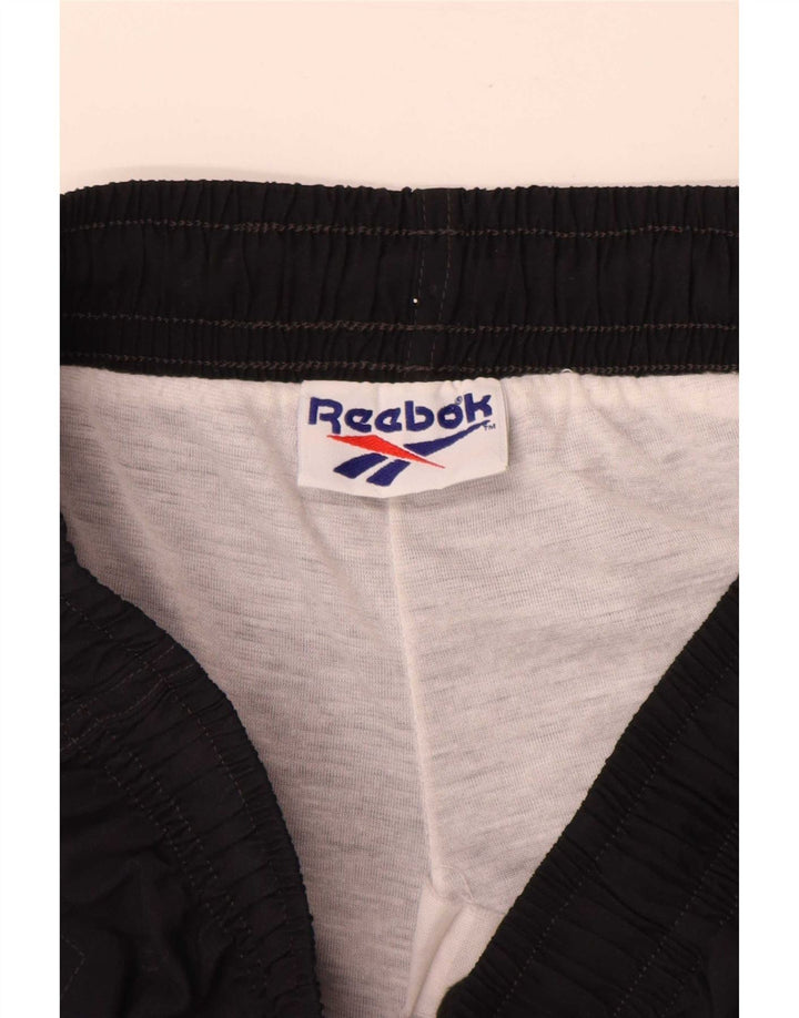 Shorts esportivos regulares masculinos Reebok grandes pretos esportivos