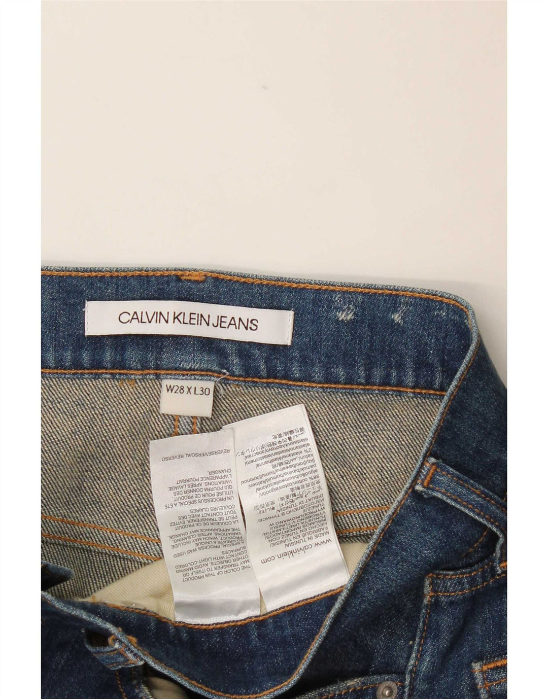Calça jeans feminina Calvin Klein desgastada slim W28 L30 azul algodão