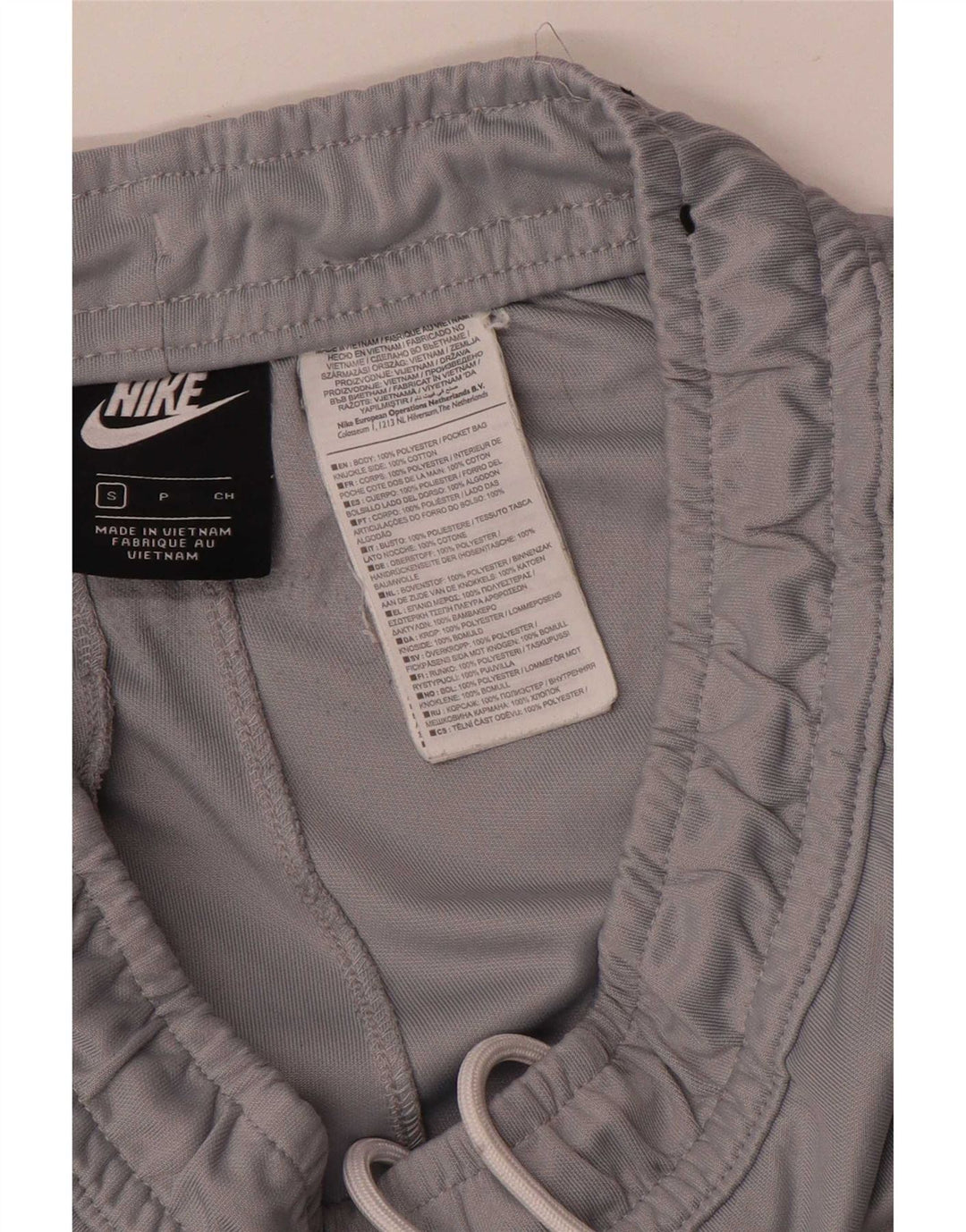 Calça esportiva Nike masculina gráfica pequena cinza colorblock poliéster