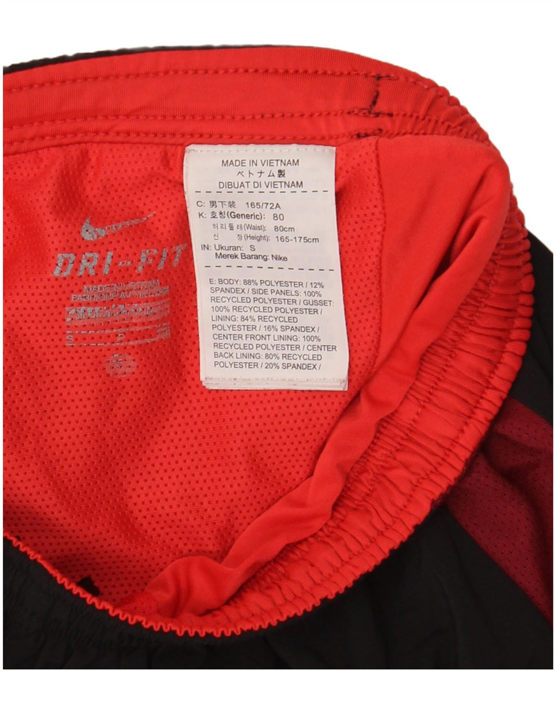 Shorts esportivos masculinos Nike Dri Fit pequenos pretos em poliéster colorblock