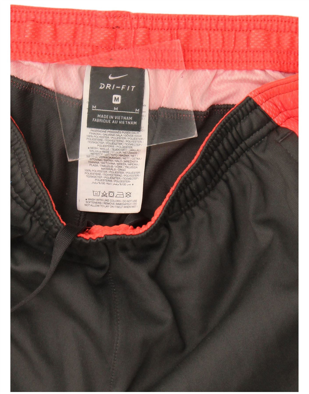 Calça de treino masculina Nike Dri Fit cinza médio colorblock poliéster