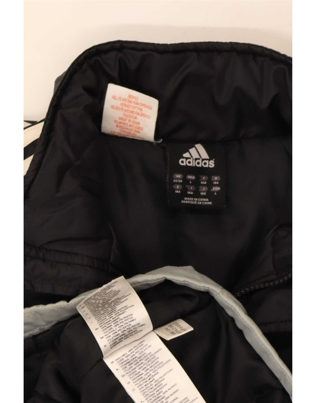 Jaqueta corta-vento masculina Adidas 13-14 anos preto colorblock poliéster