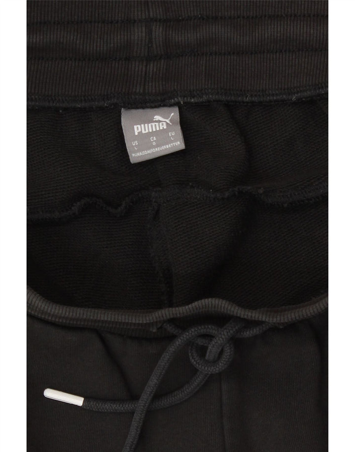Shorts esportivos gráficos femininos Puma grandes pretos