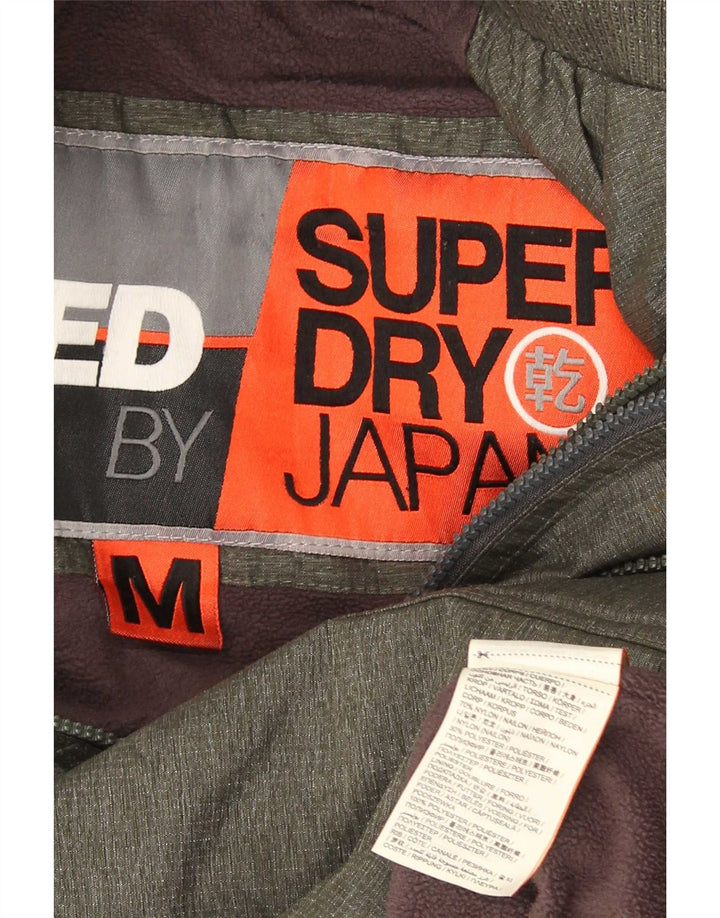 Jaqueta corta-vento masculina Superdry com capuz Reino Unido 38 Nylon cáqui médio
