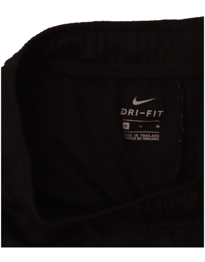 Calça esportiva feminina Nike Dri Fit Graphic UK 14 poliéster preto médio