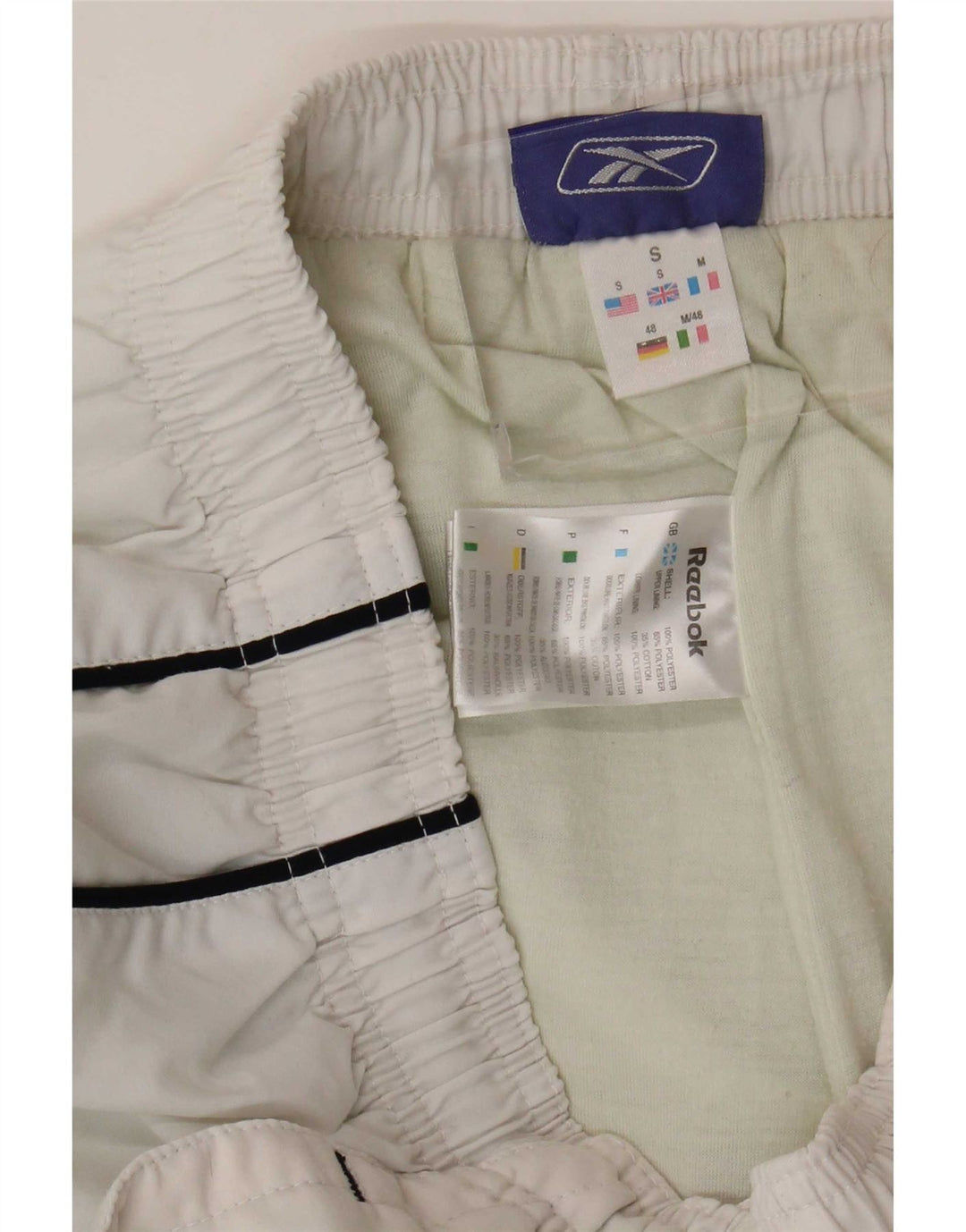 Calça de treino masculina Reebok Graphic Joggers pequeno poliéster branco