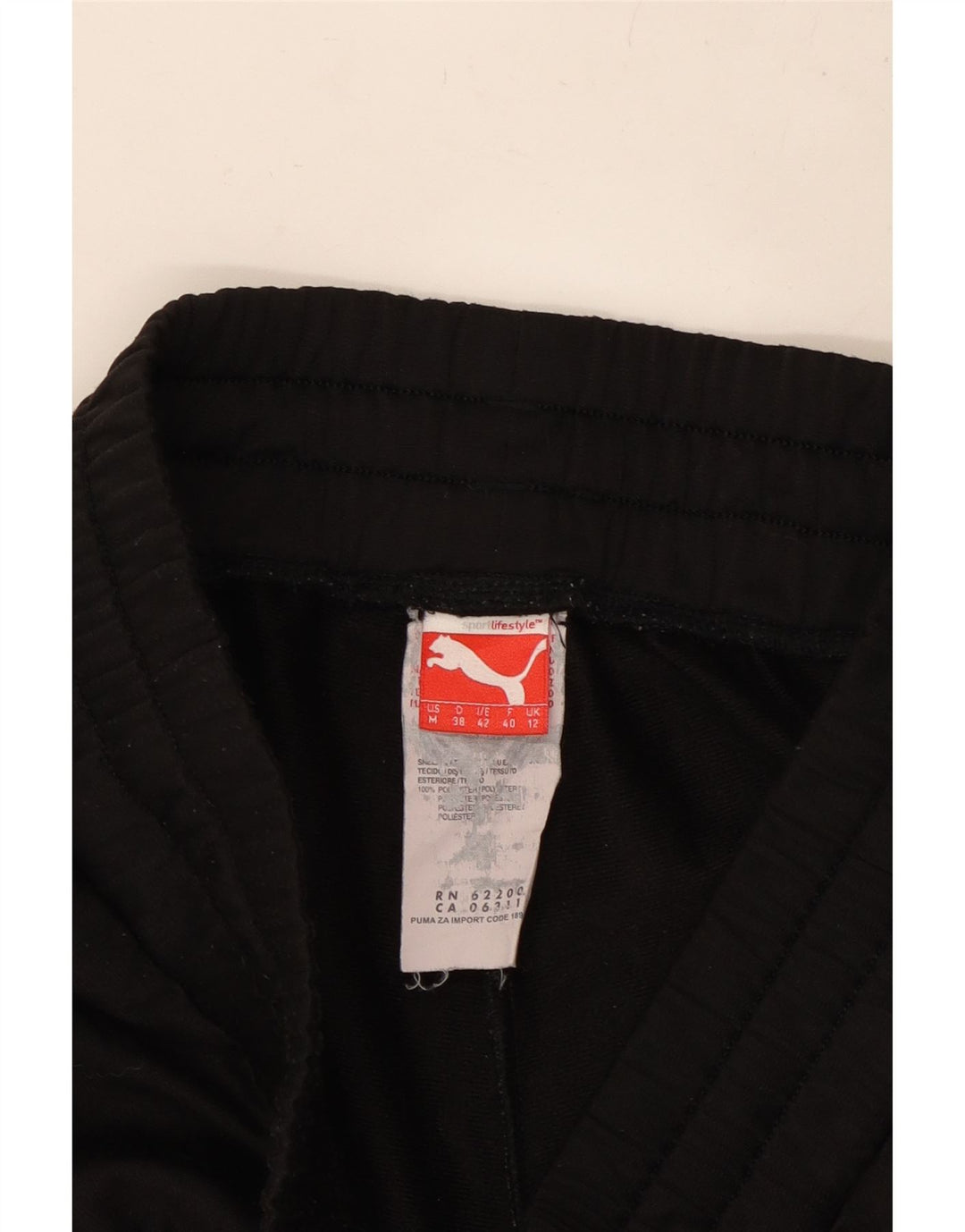 Calça de treino feminina PUMA Joggers UK 12 poliéster preto médio