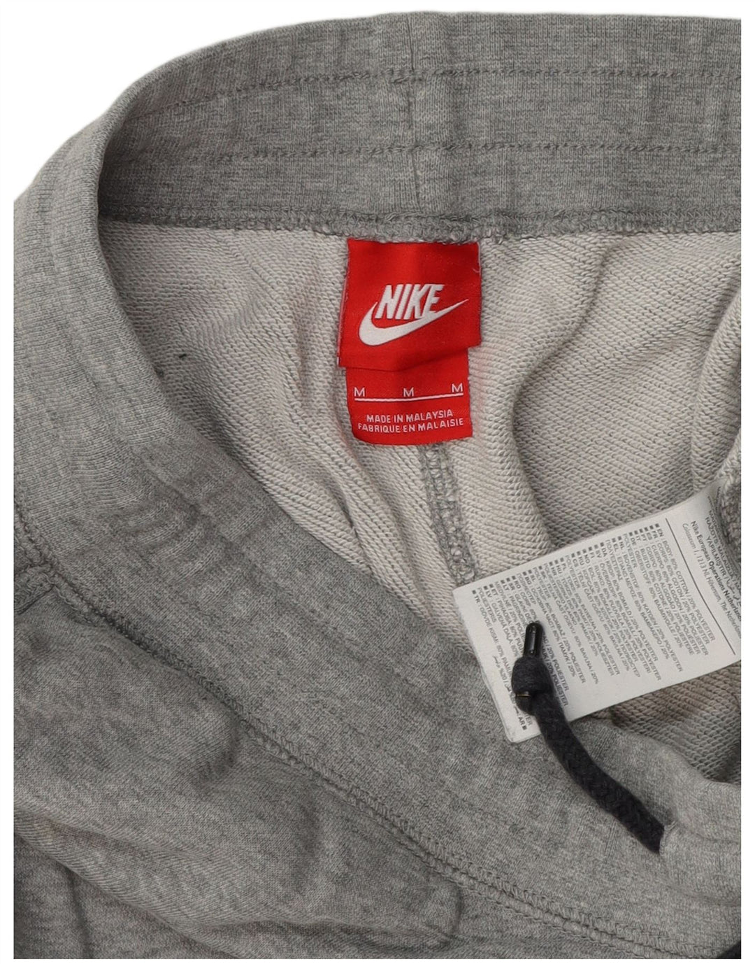 Calça de treino masculina NIKE com estampa gráfica cinza médio algodão