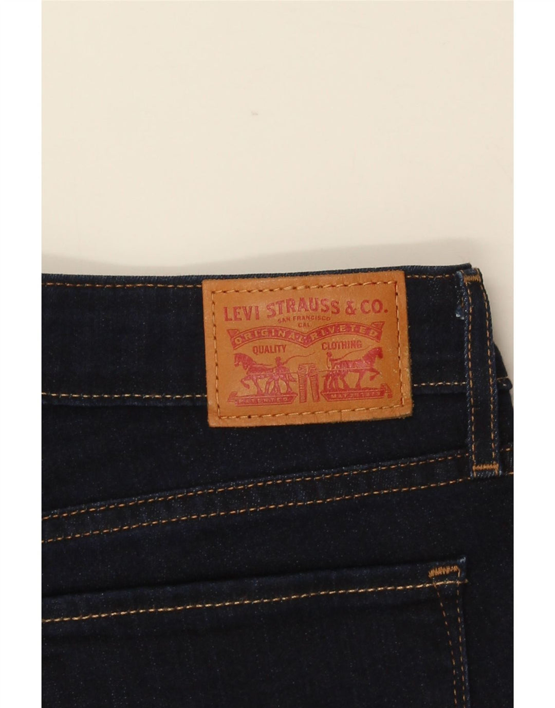 Calça jeans feminina Levi's 714 Straight W29 L31 azul marinho algodão