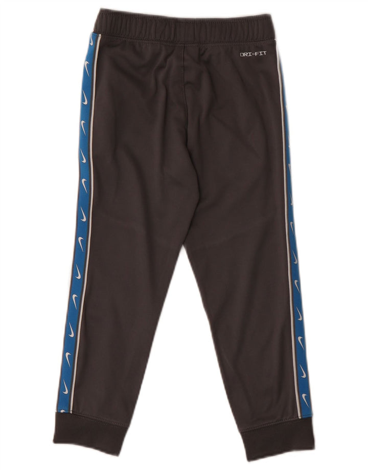 Calça de treino Nike Boys Dri Fit Joggers 5-6 anos cinza médio