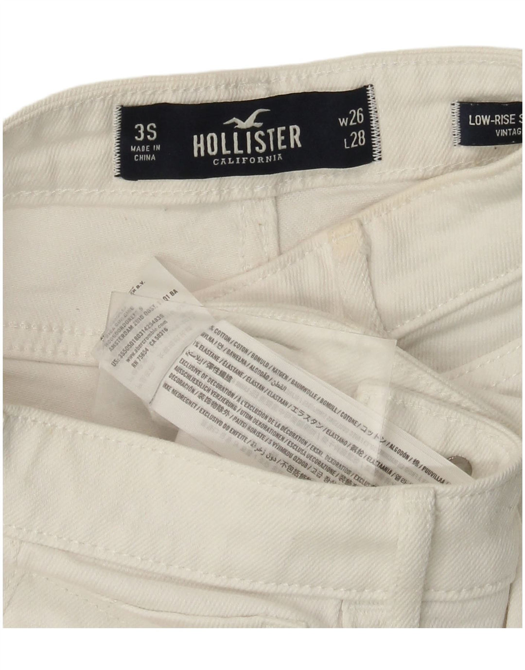 HOLLISTER Calça jeans feminina cintura baixa envelhecida W26 L28 algodão branco