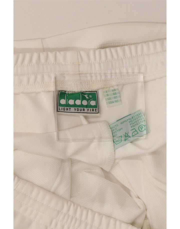Shorts esportivos masculinos DIADORA UK 40 poliéster branco médio