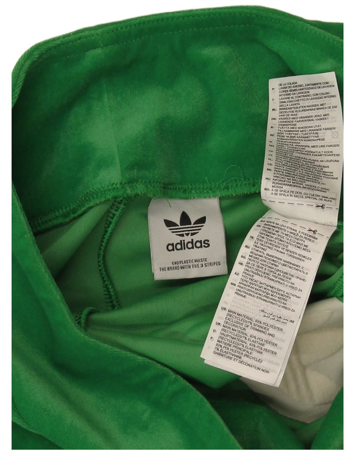 Calça de treino feminina Adidas Flare Velour UK 12 poliéster verde médio