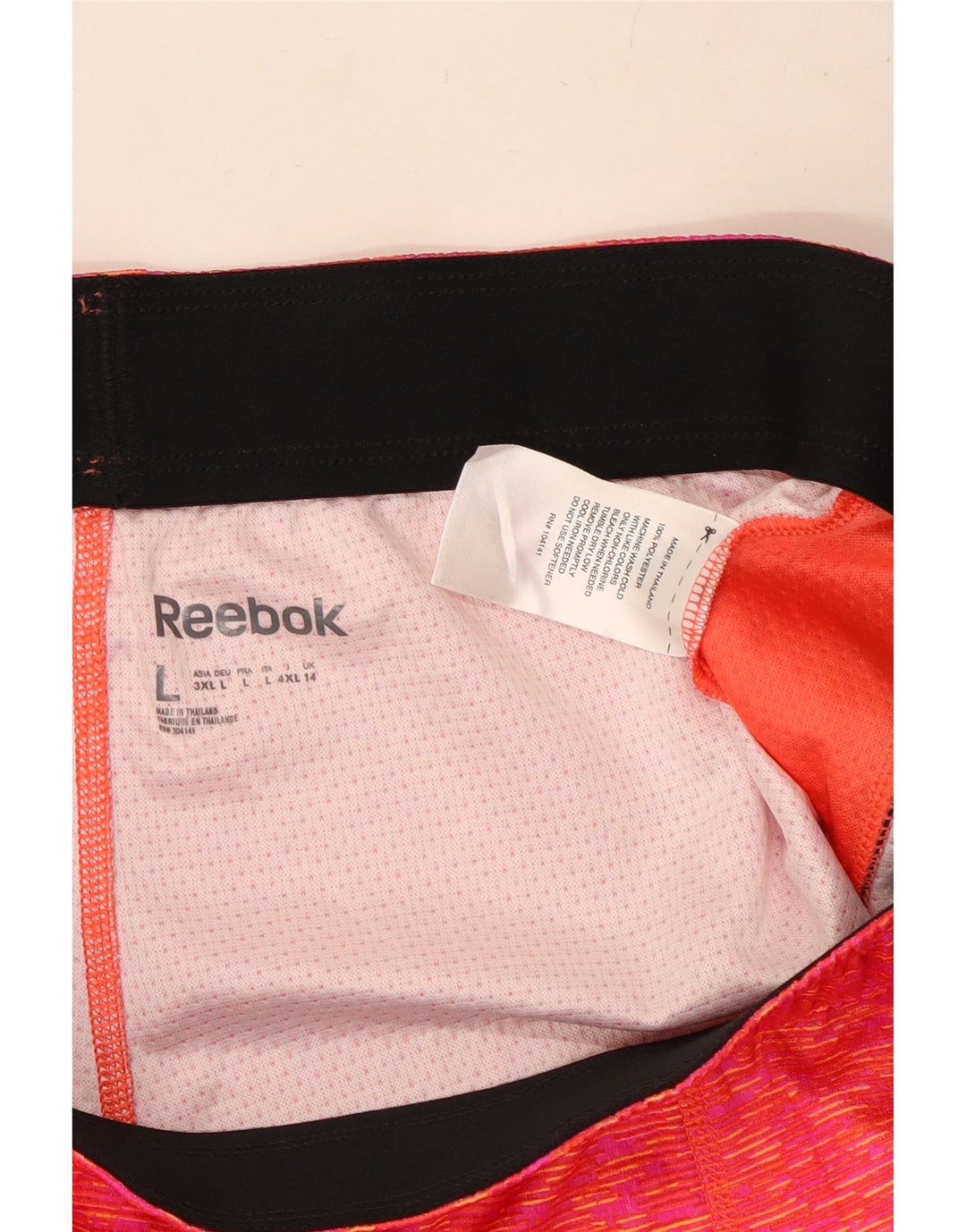 Shorts esportivos femininos Reebok UK 14 grande poliéster manchado rosa