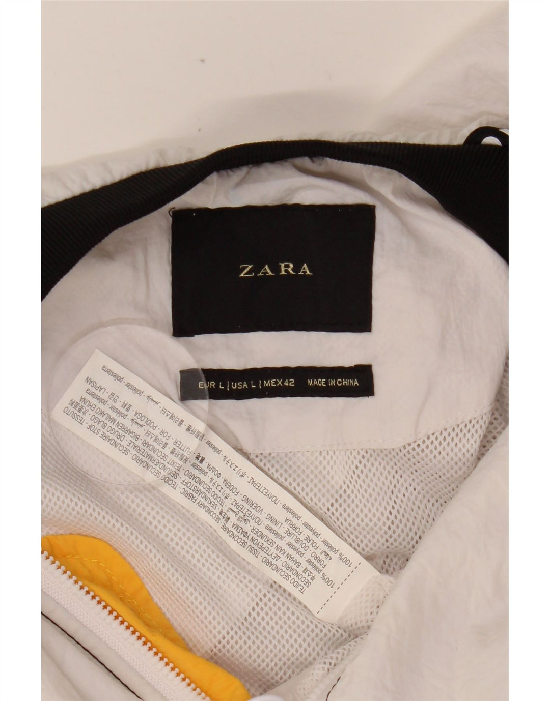 Jaqueta corta-vento masculina ZARA Graphic UK 40 grande bloco colorido branco