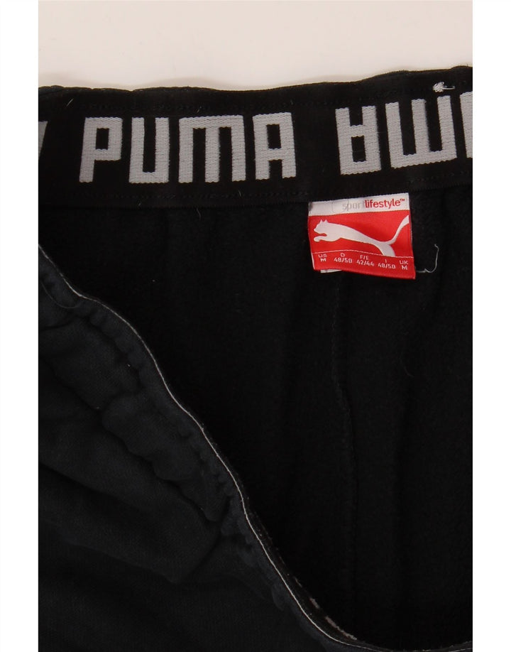 Calça de treino masculina PUMA Graphic Joggers médio preto