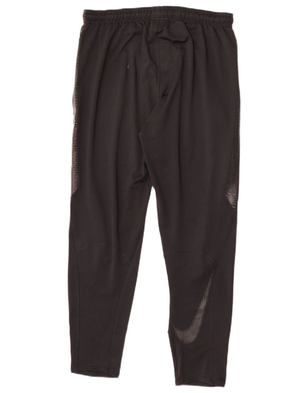 Calça de treino masculina Nike Dri Fit médio preto colorblock poliéster