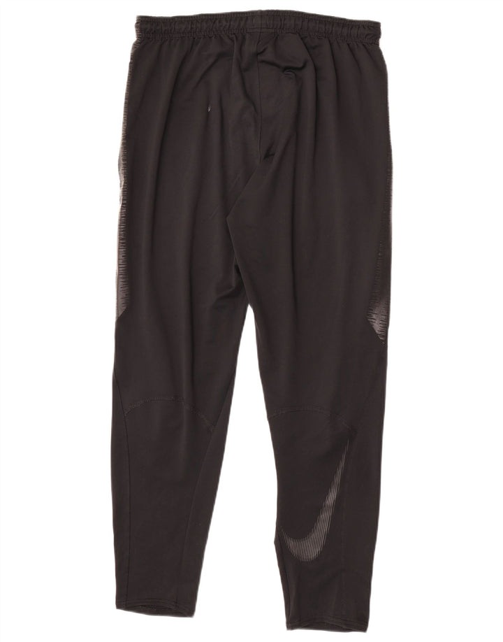 Calça de treino masculina Nike Dri Fit médio preto colorblock poliéster