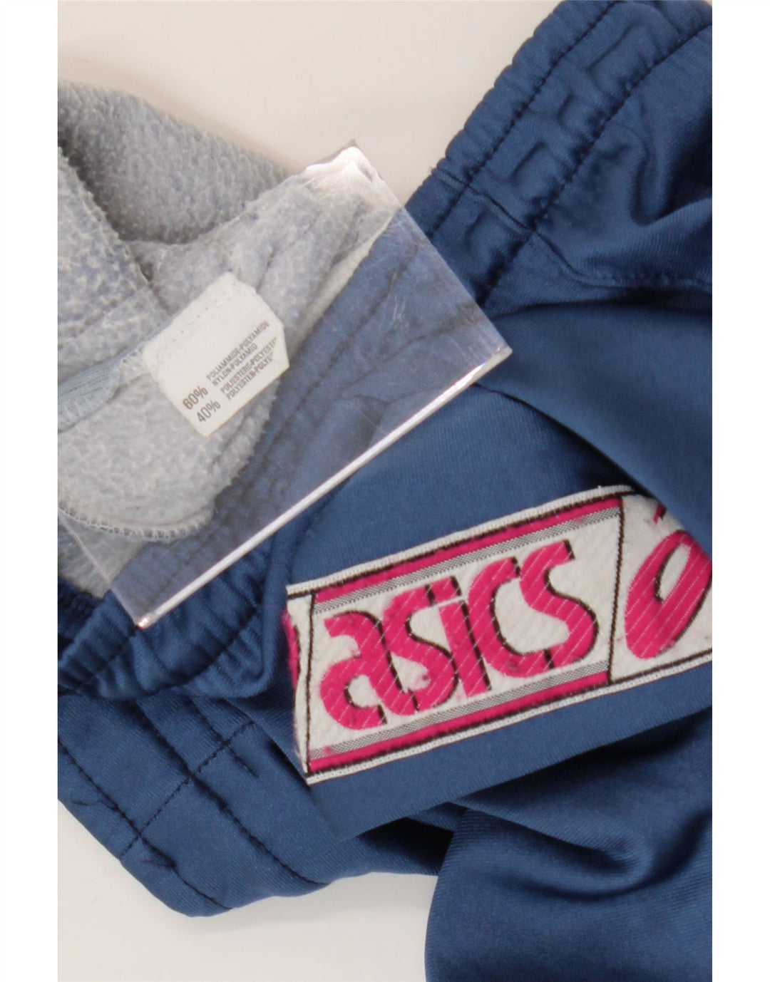 Calça de treino masculina Asics Graphic azul médio Colourblock poliamida