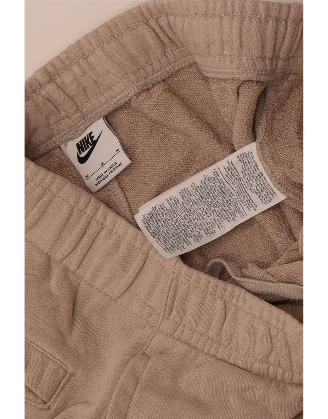 Calça de treino masculina Nike médio bege algodão