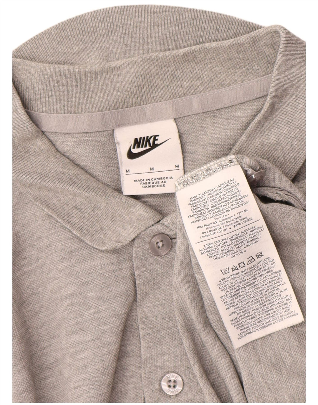 Camisa polo masculina Nike médio cinza manchado de algodão