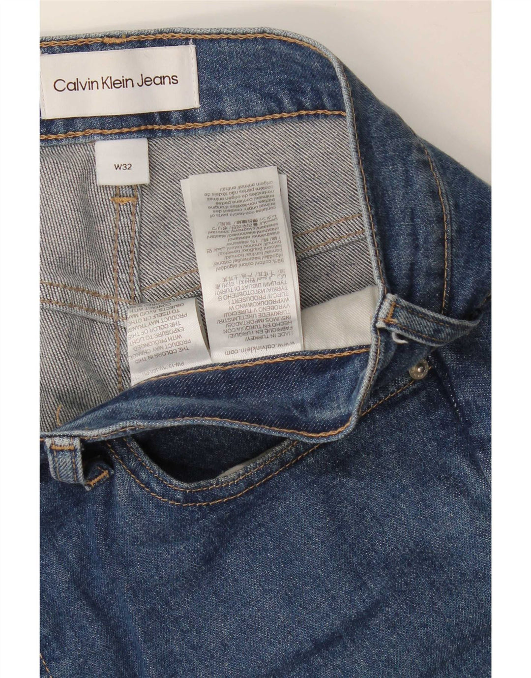 Calça jeans masculina Calvin Klein cortada W32 L25 algodão azul