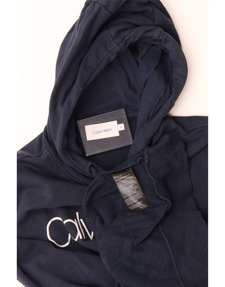 CALVIN KLEIN Mens Graphic Hoodie Jumper Medium Navy Blue Cotton Vintage Calvin Klein and Second-Hand Calvin Klein from Messina Hembry 
