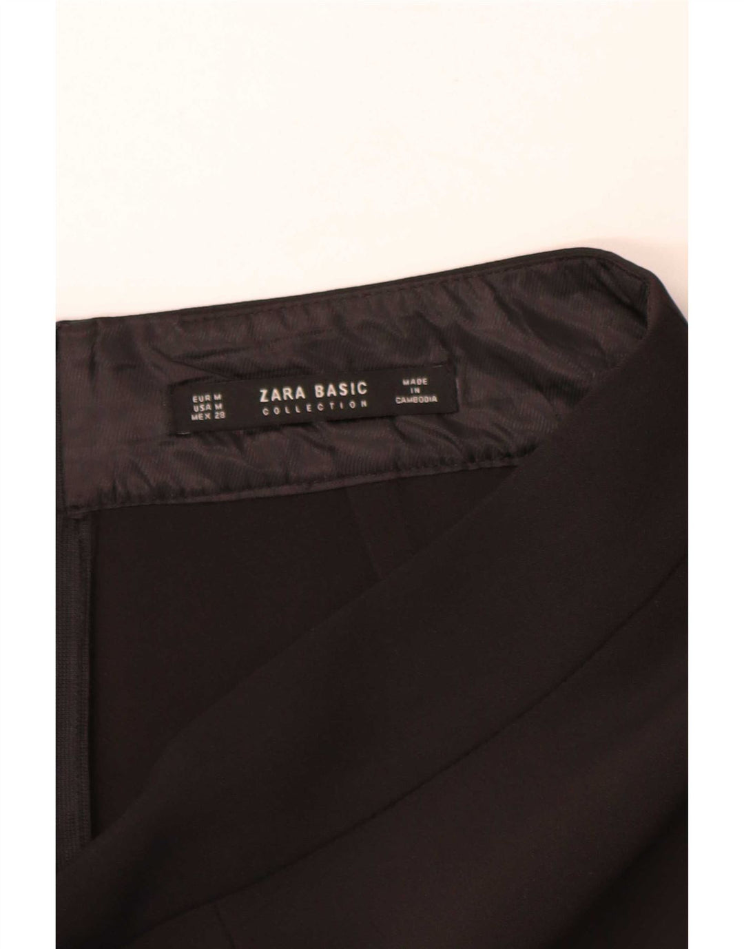 Minissaia feminina Zara média W28 preta