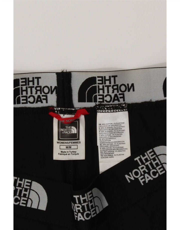 Leggings gráficas femininas The North Face UK 14 algodão preto médio