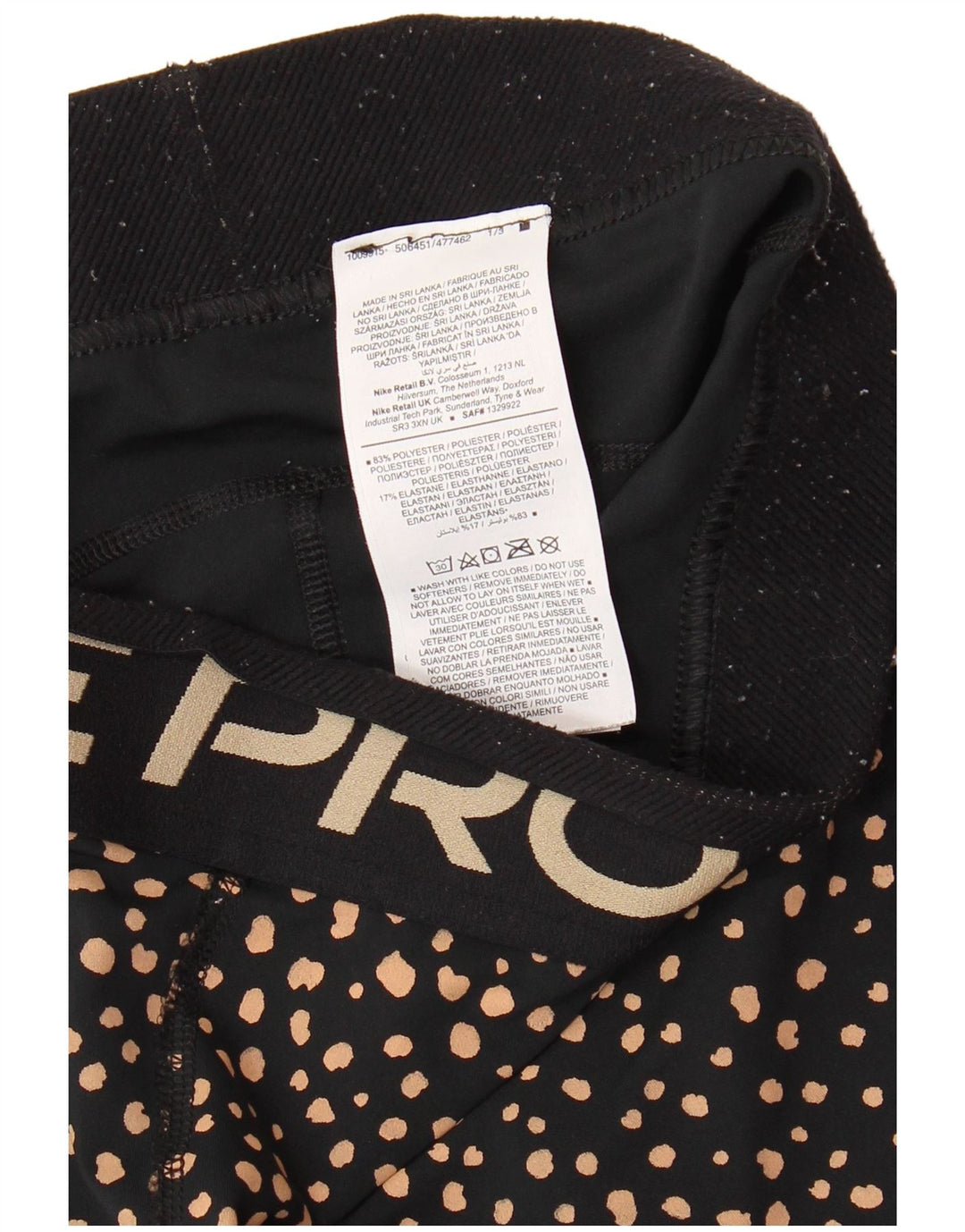 Calça legging feminina Nike Graphic Capri UK 12 média preta manchada de poliéster