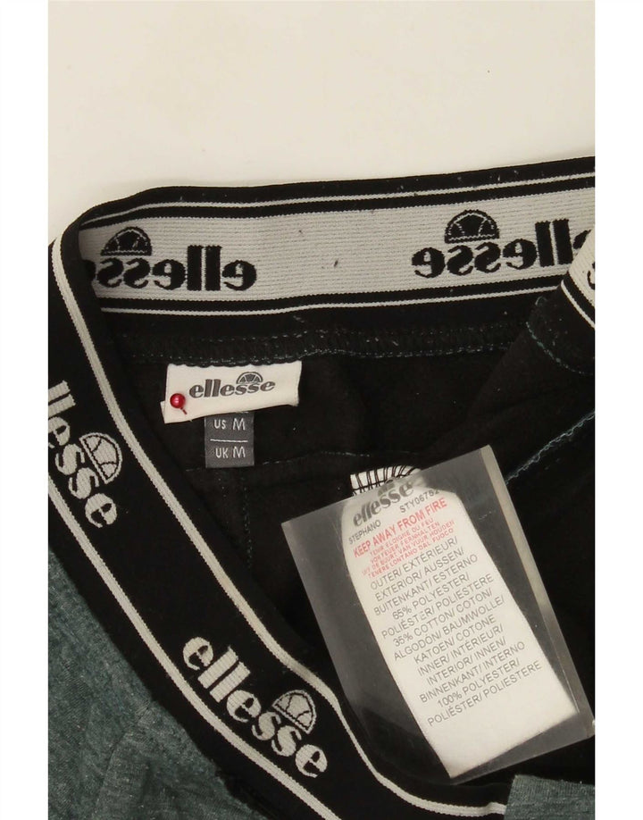 Calça feminina Ellesse com estampa gráfica em bloco verde médio