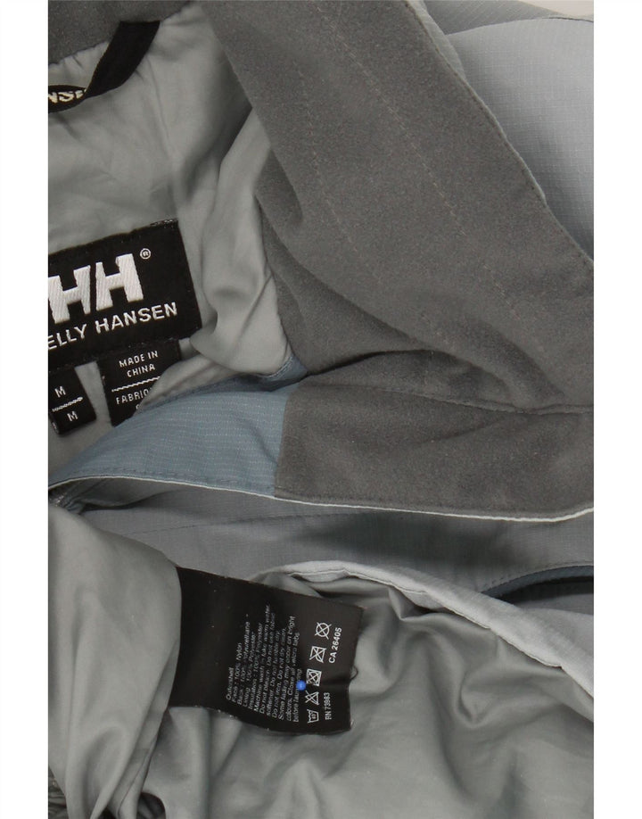 Jaqueta corta-vento feminina HELLY HANSEN com capuz Reino Unido 14 nylon azul médio