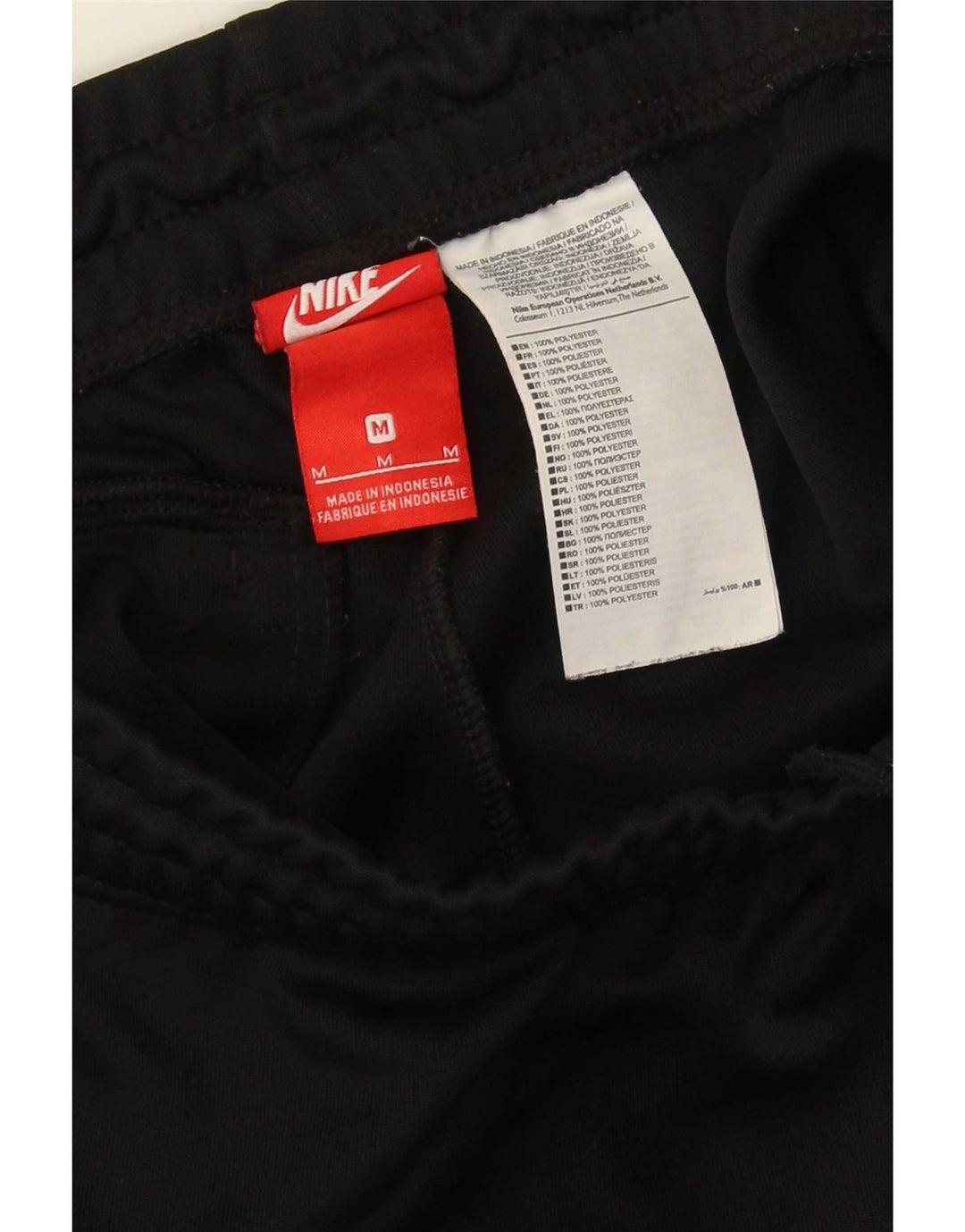 Calça de treino masculina Nike Joggers médio preto colorblock poliéster