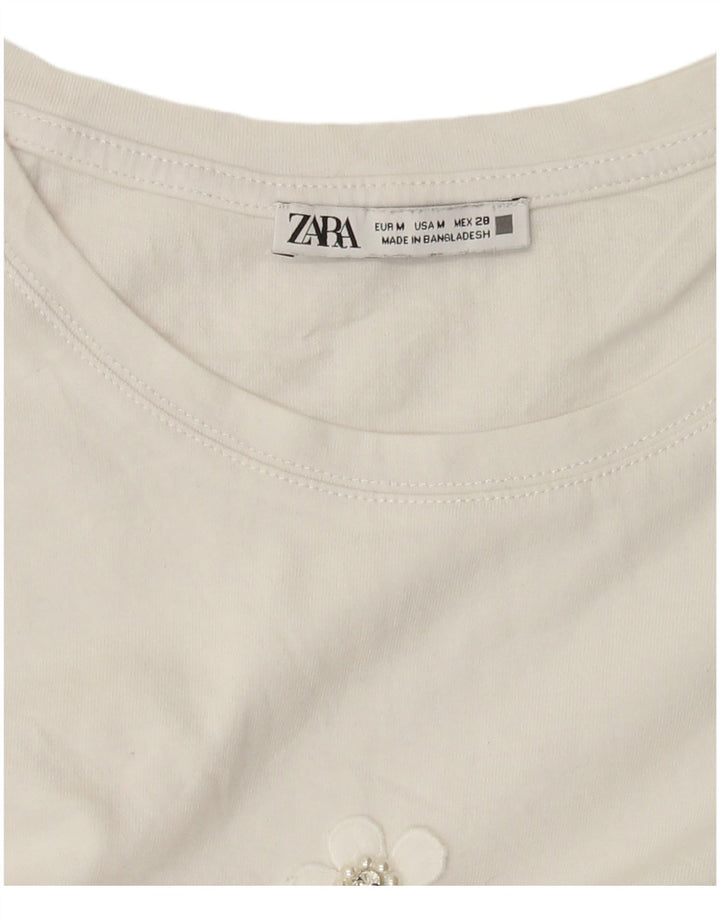 Camiseta feminina Zara UK 14 médio branco floral
